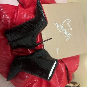 Christian Loubutton red bottoms